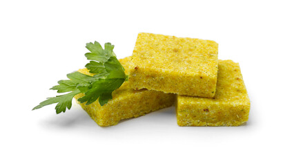 Tasty aromatic bouillon cubes and parsley isolated on white