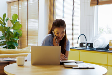 Woman enjoys book and music in modern abode.