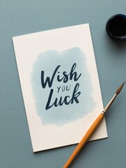 Creative handwritten wish you luck card design home studio graphic art calm environment close-up view