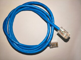 Blue Ethernet Cable coiled up for use in networking and data transmission