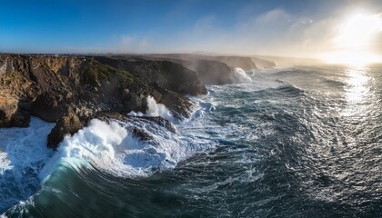 Fototapeta premium dramatic ocean waves crashing against rugged coastal cliffs a stunning aerial view of powerful surf