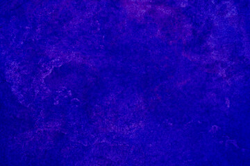 Vibrant blue abstract background with chaotic patterns, drawings and speckles