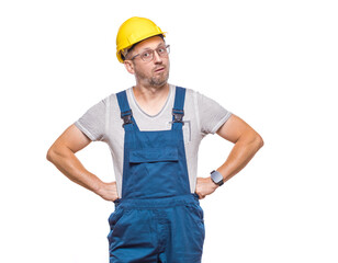 Jealousy construction worker, isolated on white background. Angry repairman. Craftsman against white wall