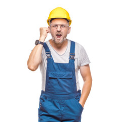 Furious middle-aged construction worker screaming and shows fist, isolated on white background. Rage repairman. Craftsman against white wall