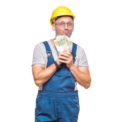 Surprised construction worker holding money, isolated on white background. Concept of dollars and...