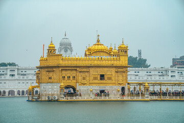 Golden Temple (Harmandir Sahib) in Amritsar, India. Sacred Sikh shrine covered in gold, surrounded by the holy Sarovar and known for its spiritual serenity.