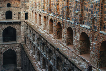 Agrasen ki Baoli, a historical stepwell in Delhi, India. Known for its symmetrical arches, deep...
