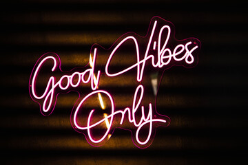 Neon sign glowing with positive message