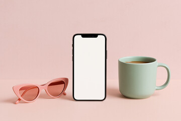 Pink sunglasses phone and coffee mug image