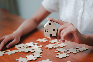 Building a business foundation home ownership insights indoor workspace puzzle pieces of success
