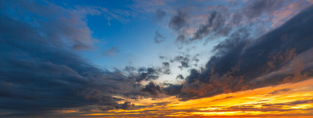 Stormy sky and colorful rain clouds in the morning,Spectacular colorful sunset amidst a cloudy sky...