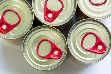 Close-up of a food can lid. Silver can for canned food on a white background. Macro food can lid.