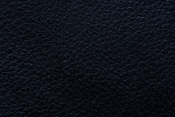 Close-up macro of black synthetic leather texture,black leather texture background, faux leather...