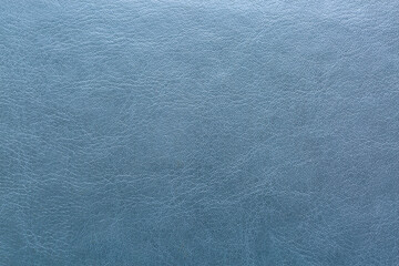 Synthetic leather in brown macro, brown synthetic leather background, gray background with leather texture