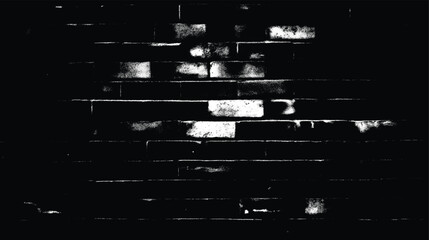 A monochrome image of a brick wall with heavy contrast and some visible damage and wear and tear