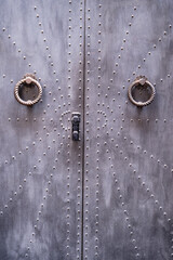 Metal Studded Door In A Building Of Caruggi ( Old Town ) In Genoa, Italy