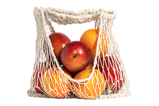 Fresh mangoes in a reusable shopping net.