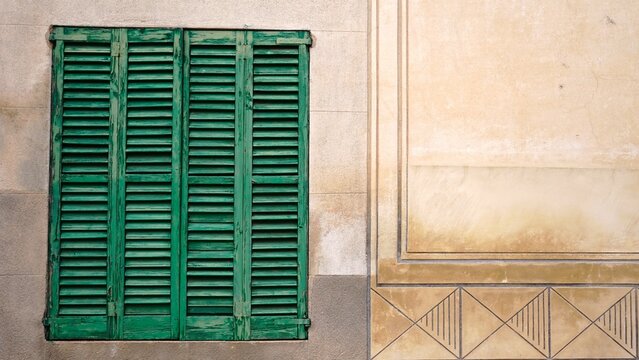 rustic window with shutters slats wood on wall - Powered by Adobe