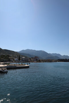Panorama of mountains, ships, boats, sea and the city of Tivat