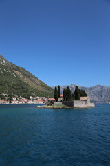 Saint George Island with the town of Perast in the background in the Bay of Kotor