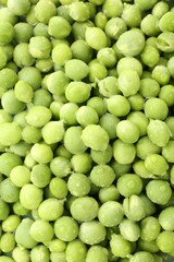 Pile of fresh green peas as background, top view