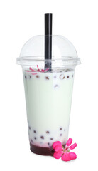 Tasty refreshing bubble tea and flower isolated on white