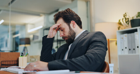 Headache, sleep or tired businessman in office for deadline, project or document report. Stress,...