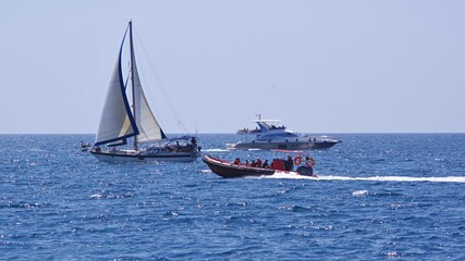 the boat is sailing in the sea