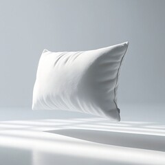 Crisp, high-resolution professional photograph depicting a pristine, blank rectangular pillow suspended horizontally in mid-air, approximately 2-3 inches above a flawless, snow-white floor.