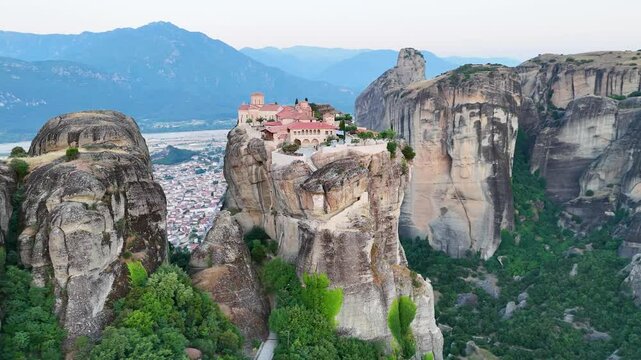 Drone view of Holy Trinity (Agia Triada) Tzagaroli Monastery and Meteora rocks in Meteora, Greece