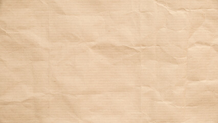 Obraz premium Brown kraft paper texture with subtle creases and warm tones for artistic backgrounds or designs.