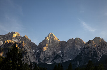 minimalist nature background with mountain peaks under clear sunset sky