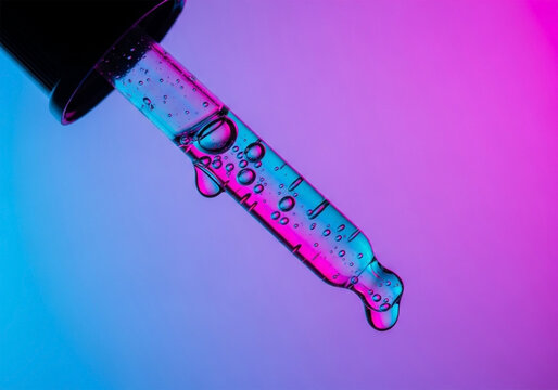 A clear glass dropper bottle with liquid dripping - Powered by Adobe
