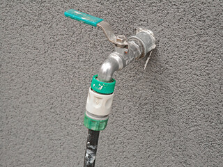 Water valve outside the building, close-up of the water tap
