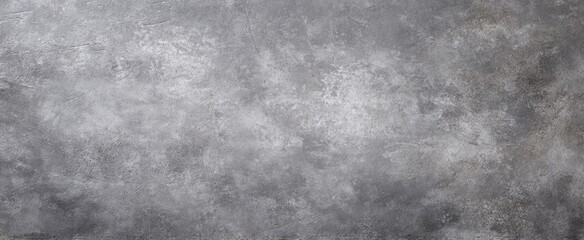 Fototapeta premium The textured gray background with an artistic concrete finish.