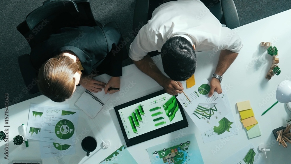 Poster top down view of business man presenting sustainable idea to manager by using tablet display esg env