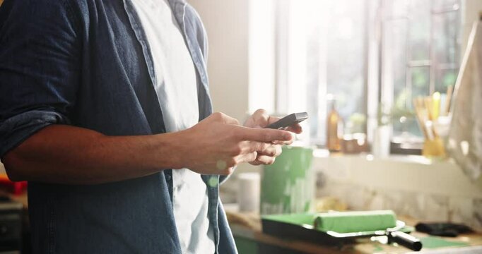 Phone, hands and renovation with man in kitchen for subcontractor research, project and paint idea. Home improvement, remodeling and diy supplier contact with person in house for communication