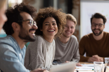  Diverse Group of Colleagues Laughing in a Meeting