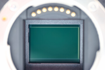 Detailed close up view of a camera sensor showing electronic components and light gathering area for photography enthusiasts