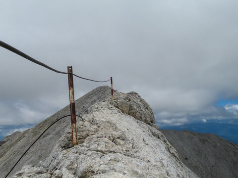 Vihren peak and Koncheto ridge in the Pirin Mountains, Bulgaria, captured with rocky alpine terrain, sharp ridges, and high-altitude landscape under clear sky, showing natural Balkan scenery