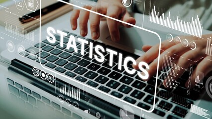 Hands Typing on Laptop Keyboard with Digital Statistics Overlay and Data Visualization Graphics....