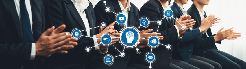 A captivated audience applauding during a technology presentation, surrounded by icons representing...