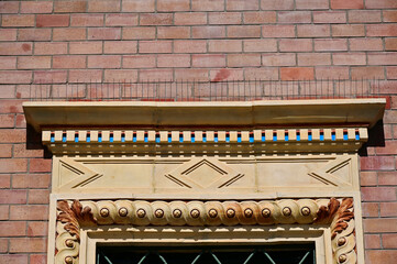 metal spike anti-roosting or bird prevention and repellent strip. bird control. old exterior stucco...
