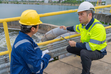 Environmental engineers work at wastewater treatment plants,Water supply engineering working at...