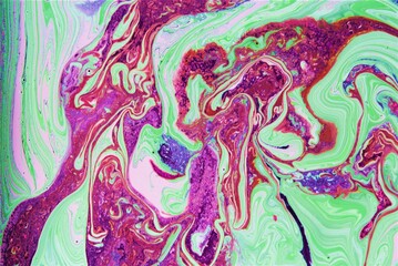 Fluid art- marbled effect. Abstract artwork- stain, splashes, smearing the dye. Liquid acrylic- color blot. Pigment water background