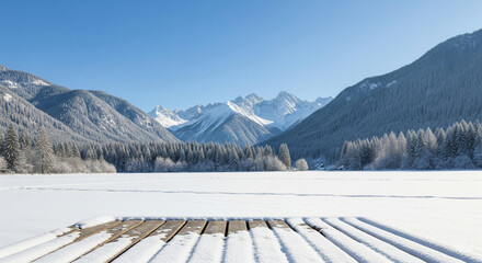 A snowcovered dock extends into a frozen lake, offering a breathtaking view of majestic snowcapped mountains under a clear blue sky