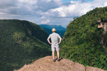 Man standing next to Kaieteur Falls in Guyana 