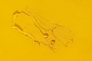Extremely close-up view of a transparent gel with bubbles and colloidal gold. Cosmetic products
