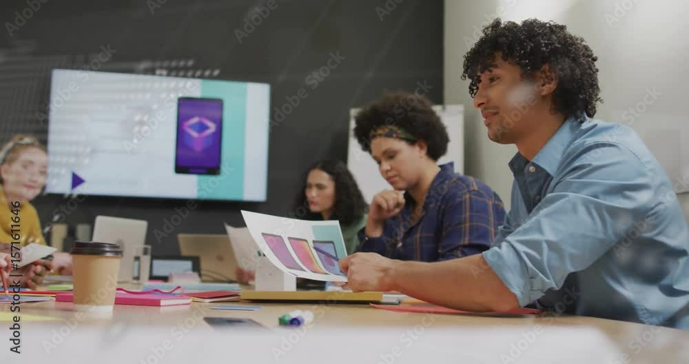 Poster after code overlay fading, design team reviewing swatches selecting layout with ui updating
