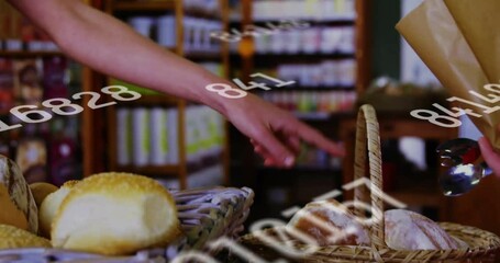 Customer reaching over bread and rolls, attendant picking baguettes with tongs for bakery checkout - Powered by Adobe